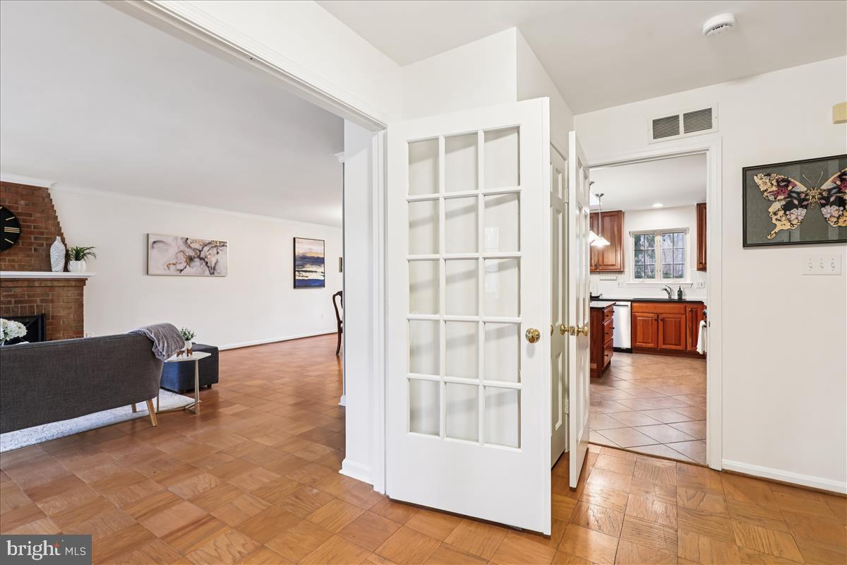12145 Stirrup Road Reston, VA 20191 - Photo 31 of 80 a living room with furniture and a flat screen tv