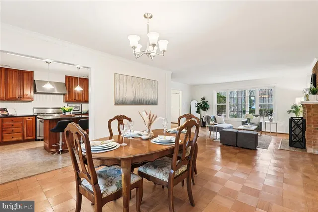 a bedroom with a bed and a wooden floor