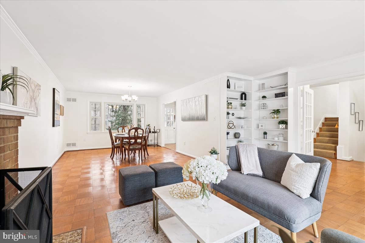 12145 Stirrup Road Reston, VA 20191 - Photo 40 of 80 a living room with furniture and wooden floor