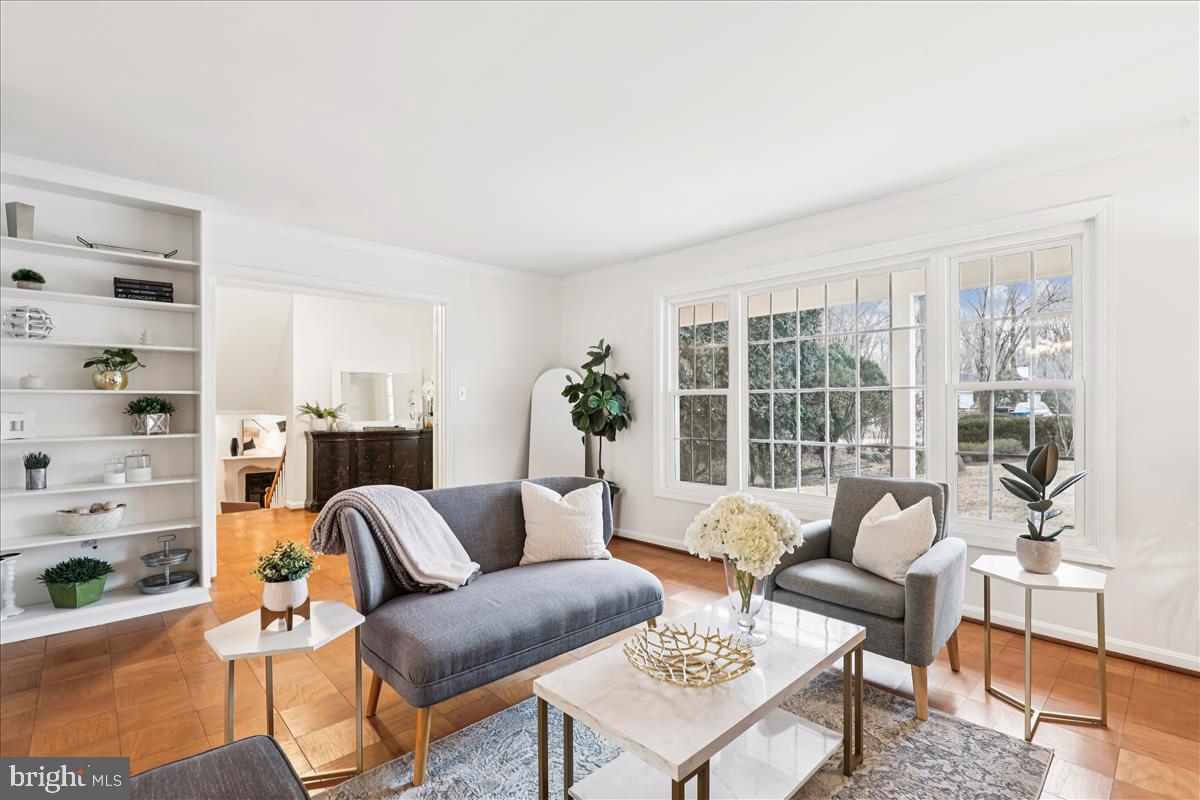 12145 Stirrup Road Reston, VA 20191 - Photo 41 of 80 a living room with furniture and a floor to ceiling window