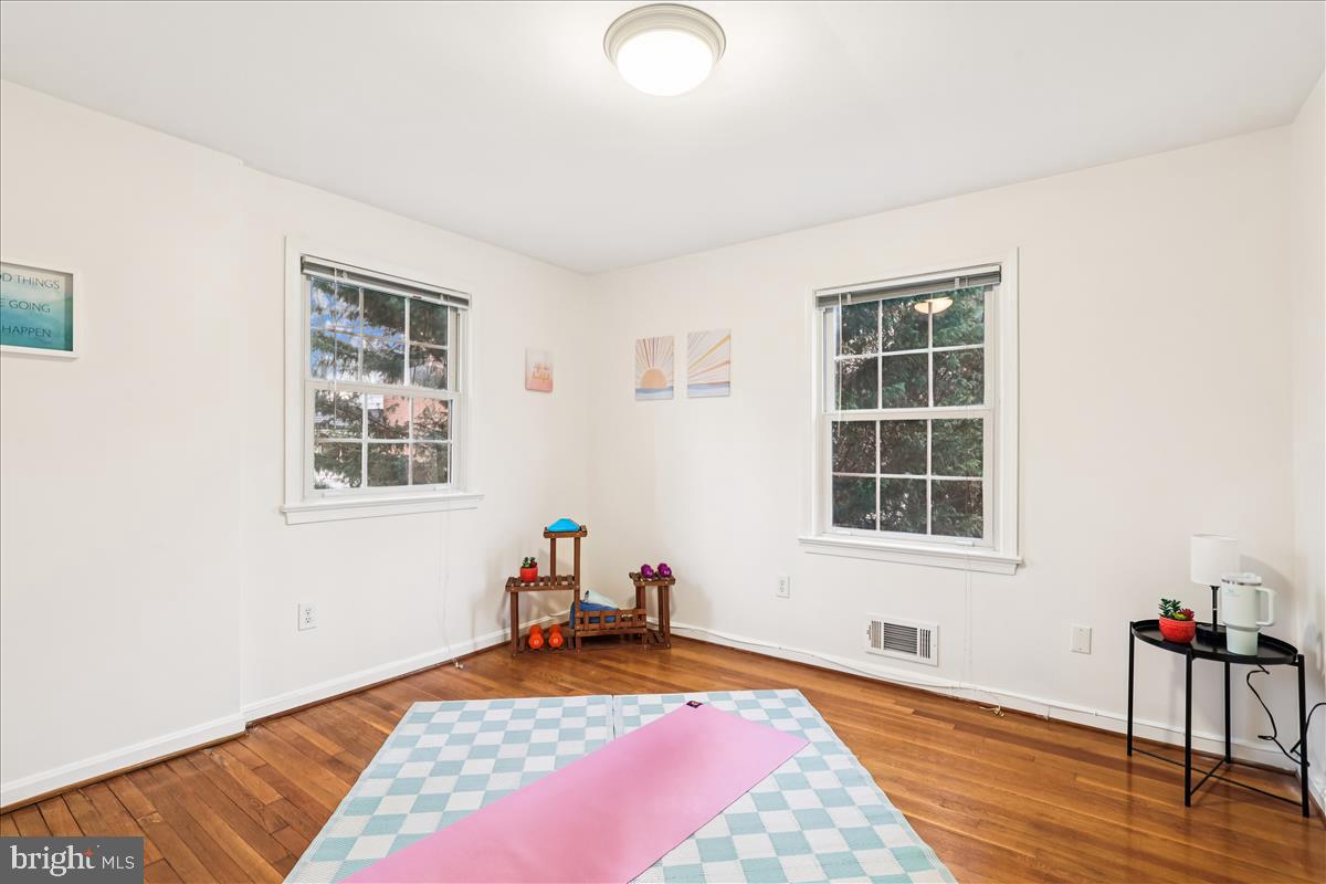 12145 Stirrup Road Reston, VA 20191 - Photo 49 of 80 a bed room with a bed and a window