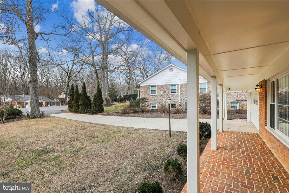 12145 Stirrup Road Reston, VA 20191 - Photo 7 of 80 a view of a parking space in the middle of a house