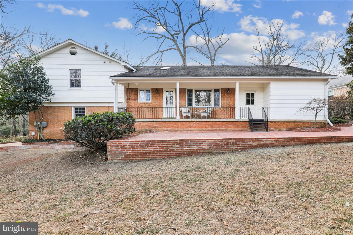 12145 Stirrup Road Reston, VA 20191 - Photo 8 of 80 front view of a house with a yard