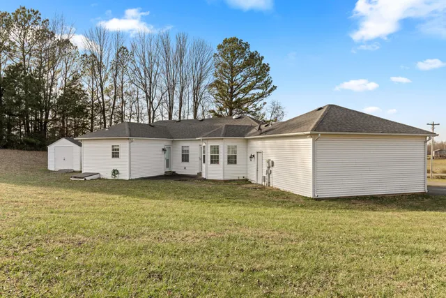a house view with a garden space