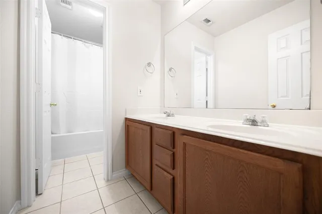 a bedroom with a bed and a cabinets