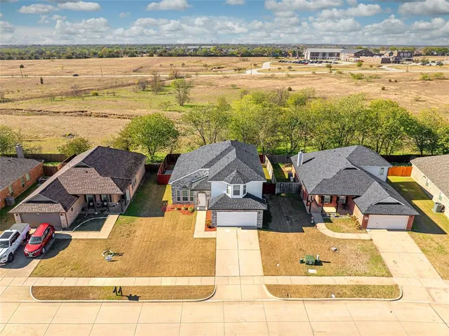 a view of swimming pool with an outdoor seating space