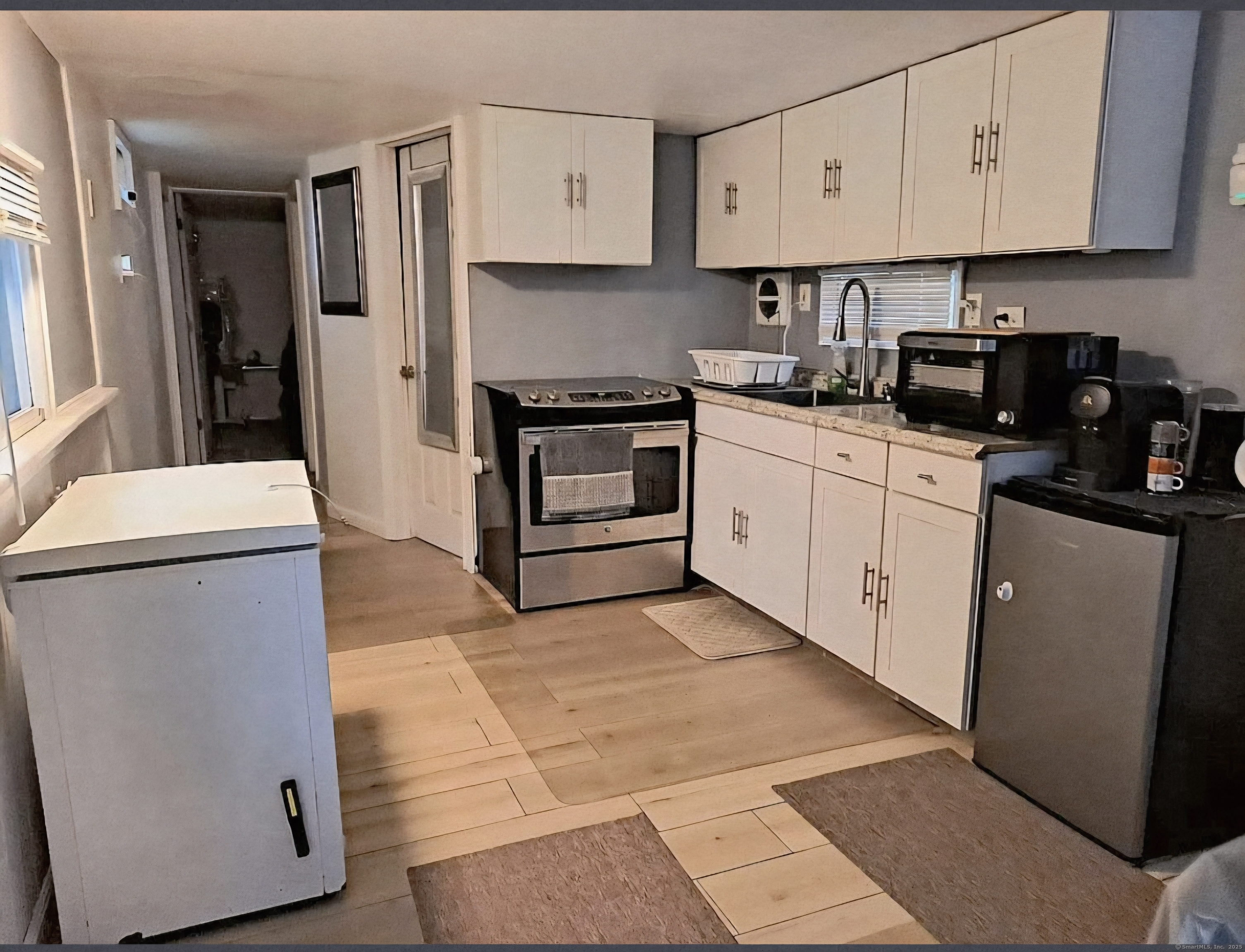 8 Cook Terrace Westbrook, CT 06498 - Photo 4 of 15 a kitchen with cabinets and appliances
