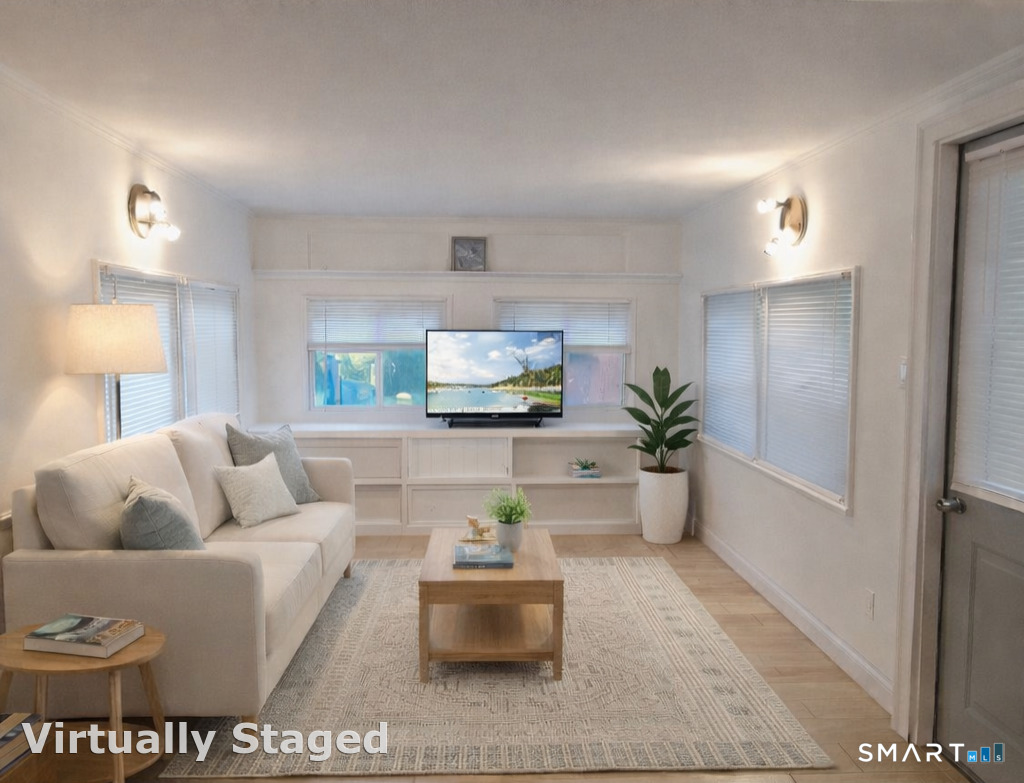 8 Cook Terrace Westbrook, CT 06498 - Photo 7 of 15 a living room with furniture and a potted plant