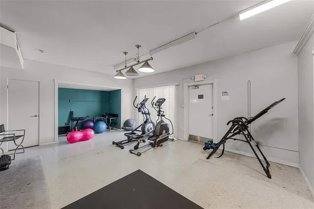 a view of a room with gym equipment
