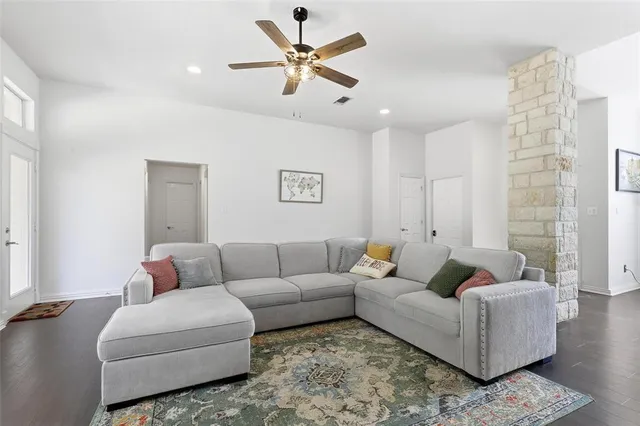 a living room with furniture and a couch