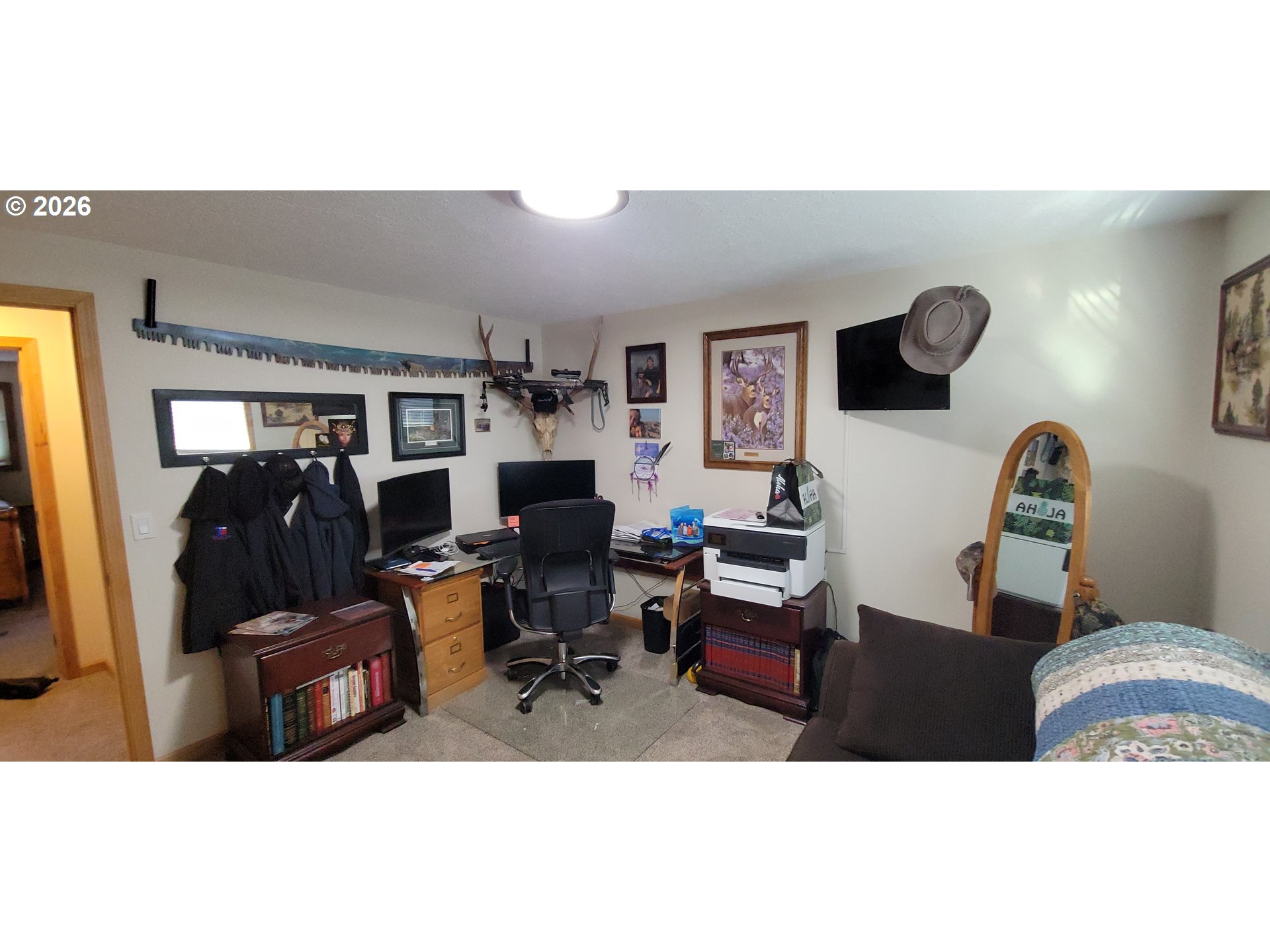 698 South Cascade Drive Woodburn, OR 97071 - Photo 15 of 19 a living room with furniture and a flat screen tv