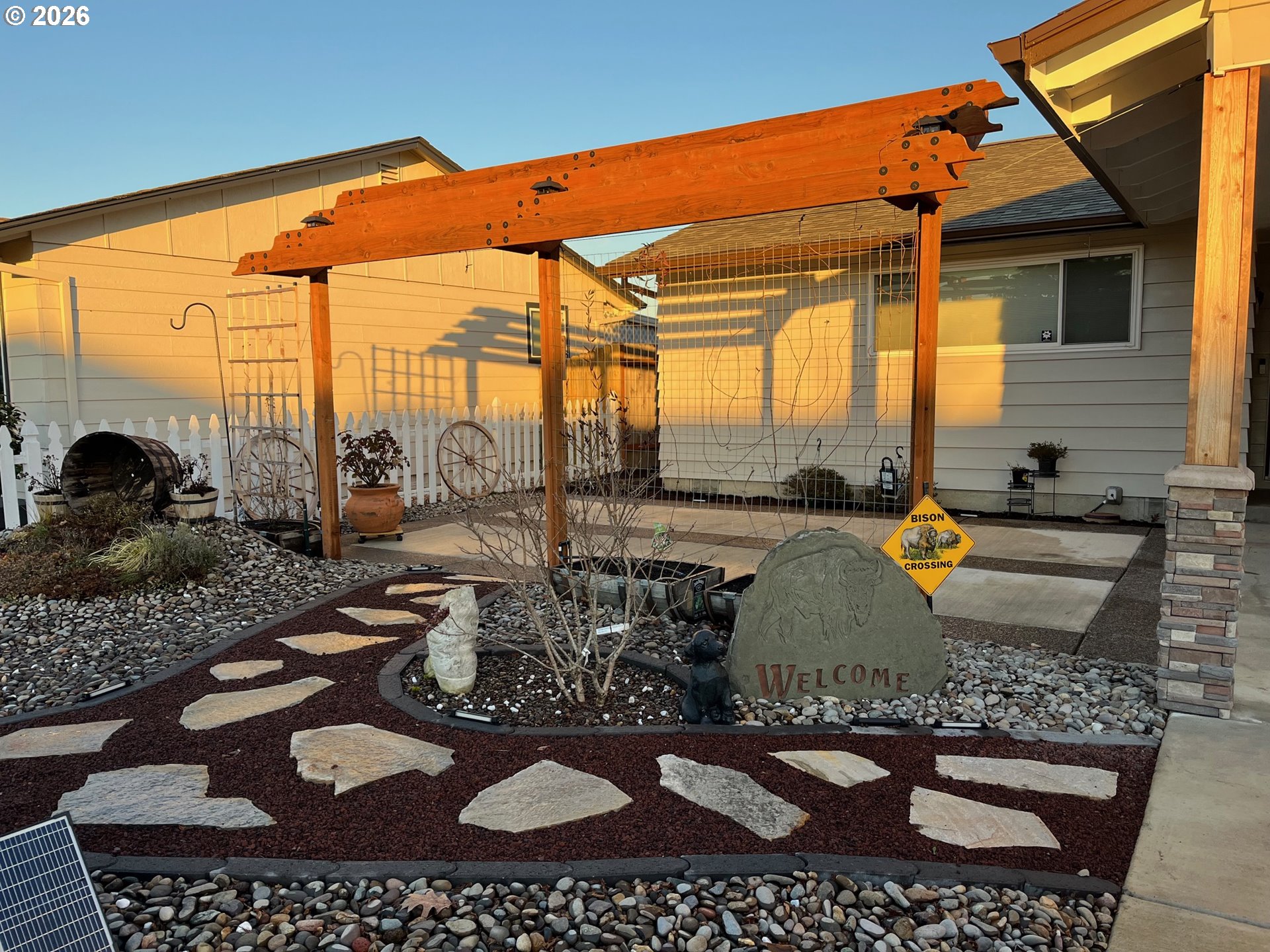698 South Cascade Drive Woodburn, OR 97071 - Photo 4 of 19 a view of swimming pool with outdoor seating