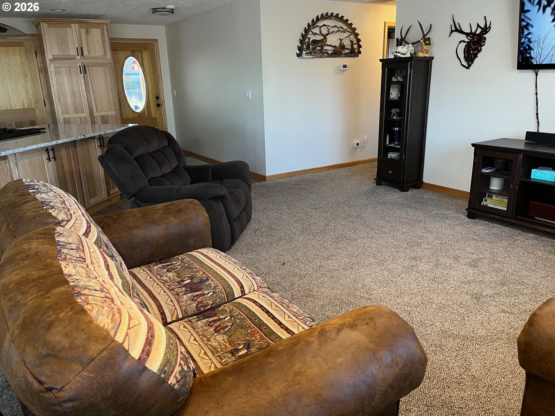 698 South Cascade Drive Woodburn, OR 97071 - Photo 9 of 19 a living room with furniture