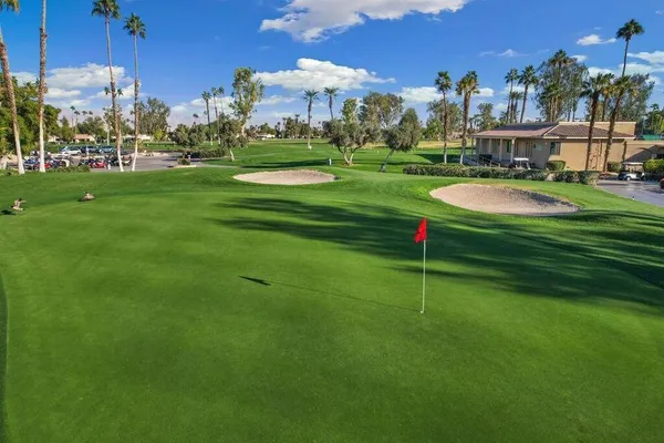 a view of a house with a swimming pool