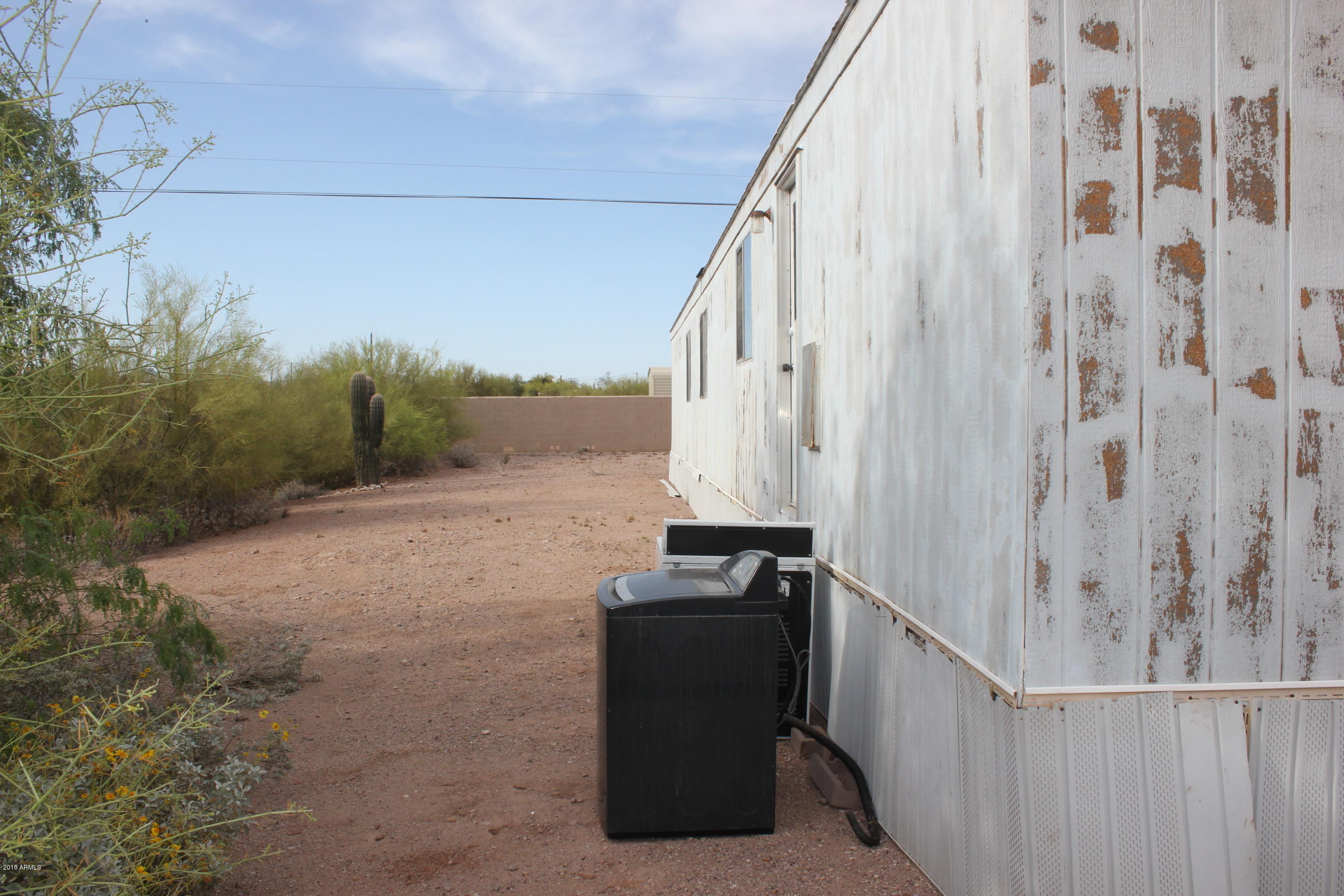 125 South Hilton Road Apache Junction, AZ 85119 - Photo 13 of 15 West side of home