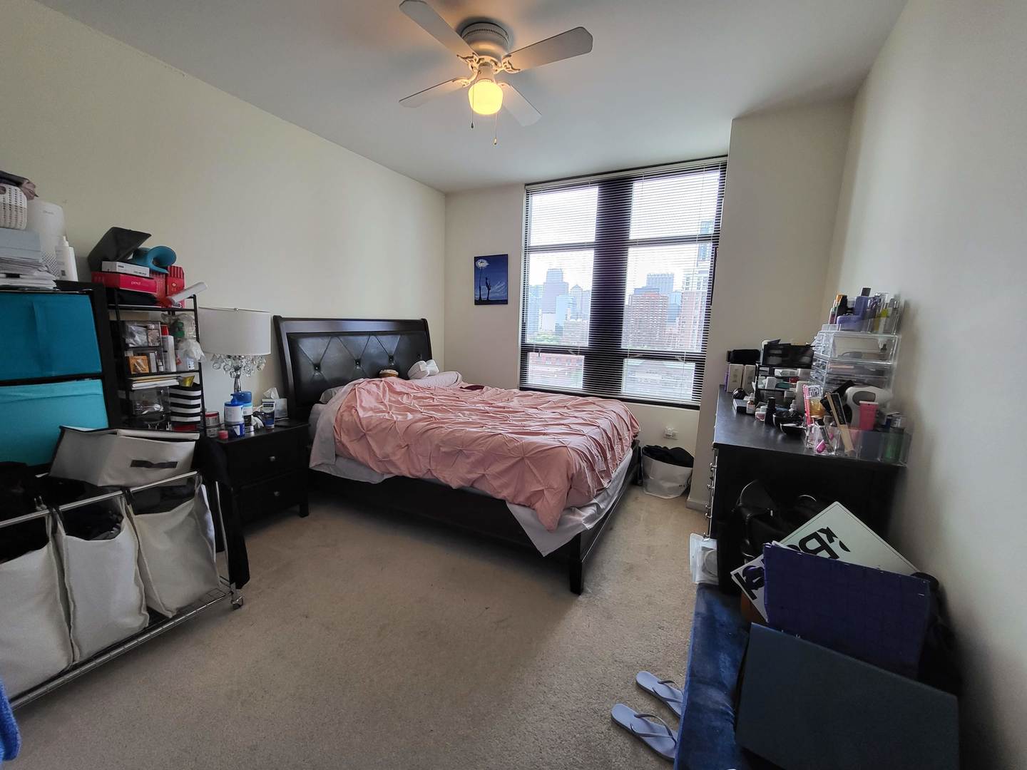 1255 South State Street, Unit 1203 Chicago, IL 60605 - Photo 13 of 21 a bedroom with a bed and a window