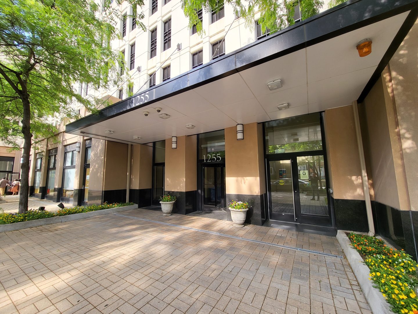 1255 South State Street, Unit 1203 Chicago, IL 60605 - Photo 2 of 21 a front view of a building with traffic signal lights