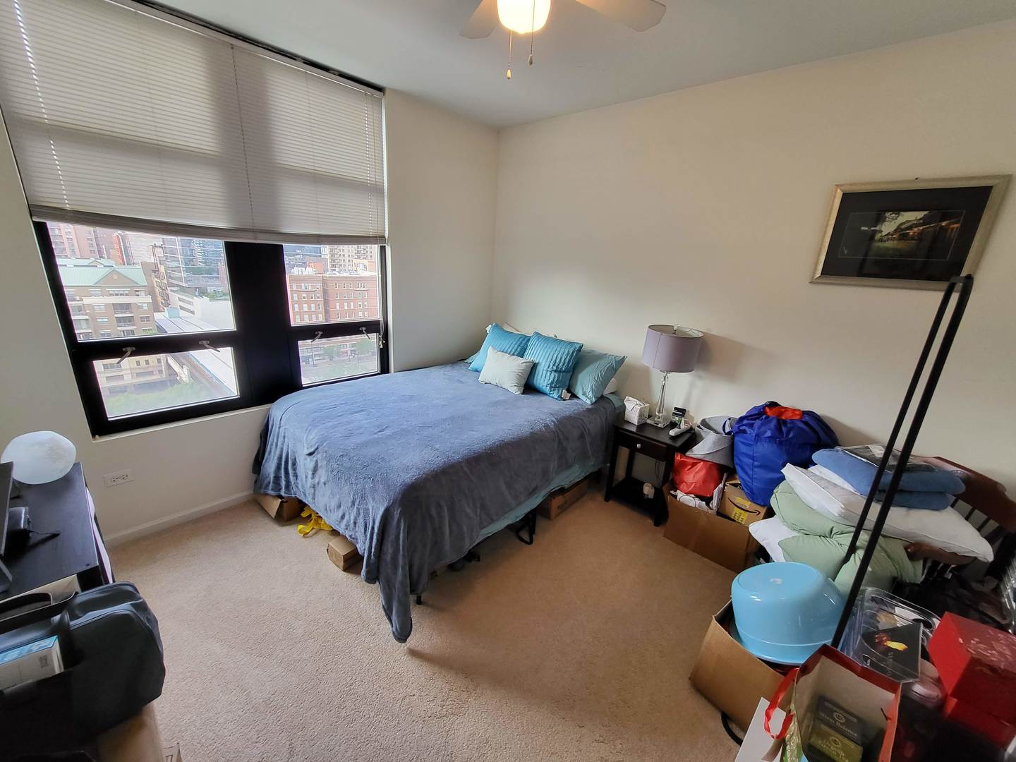 1255 South State Street, Unit 1203 Chicago, IL 60605 - Photo 10 of 21 a bedroom with a bed and large windows