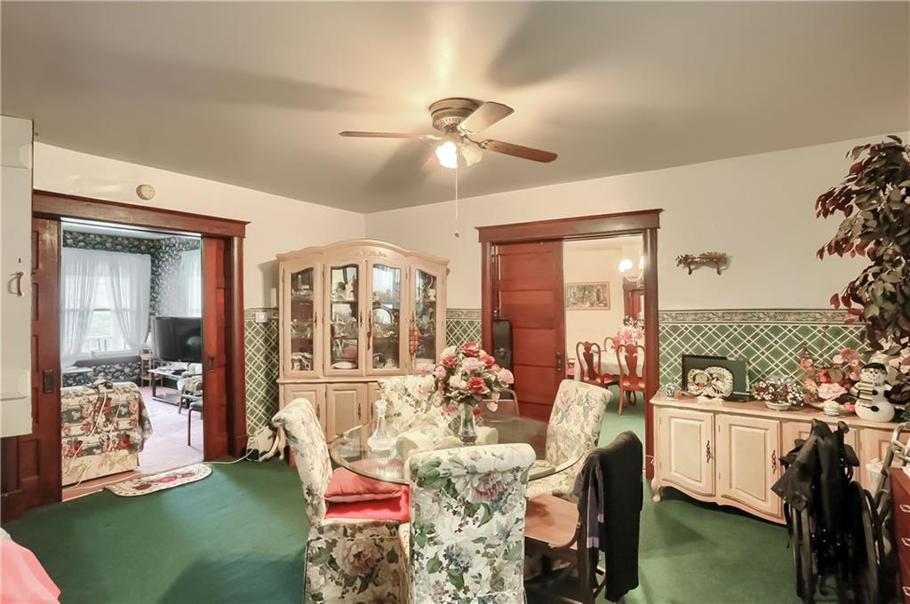 191 Pyle Road Jefferson, PA 15344 - Photo 12 of 24 a living room with furniture and a floor to ceiling window