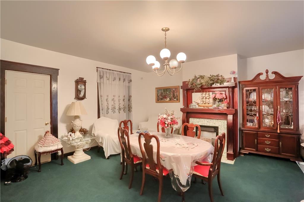 191 Pyle Road Jefferson, PA 15344 - Photo 13 of 24 a view of a dining room with furniture and chandelier