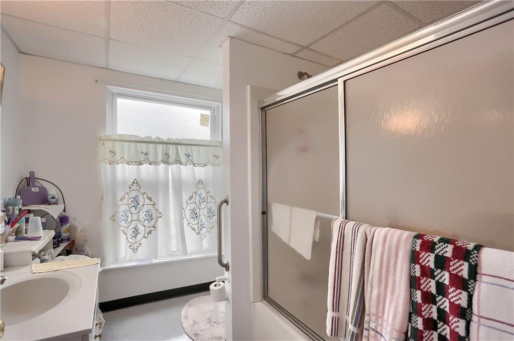 191 Pyle Road Jefferson, PA 15344 - Photo 14 of 24 a bedroom with a bed and a window