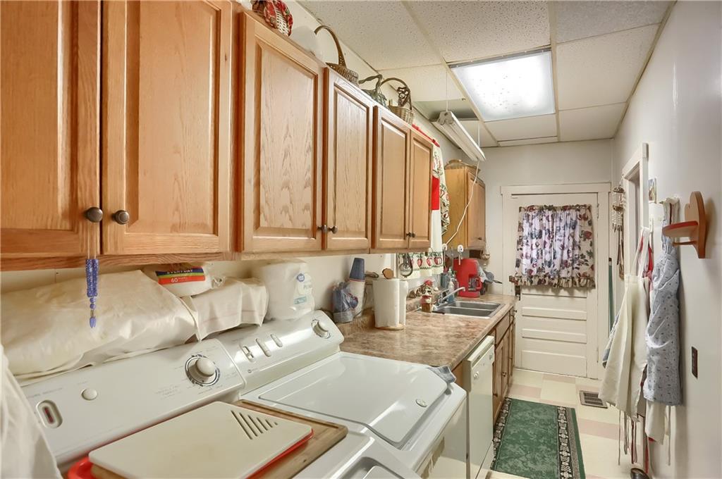 191 Pyle Road Jefferson, PA 15344 - Photo 8 of 24 a view of a kitchen area with furniture and floor to ceiling windows