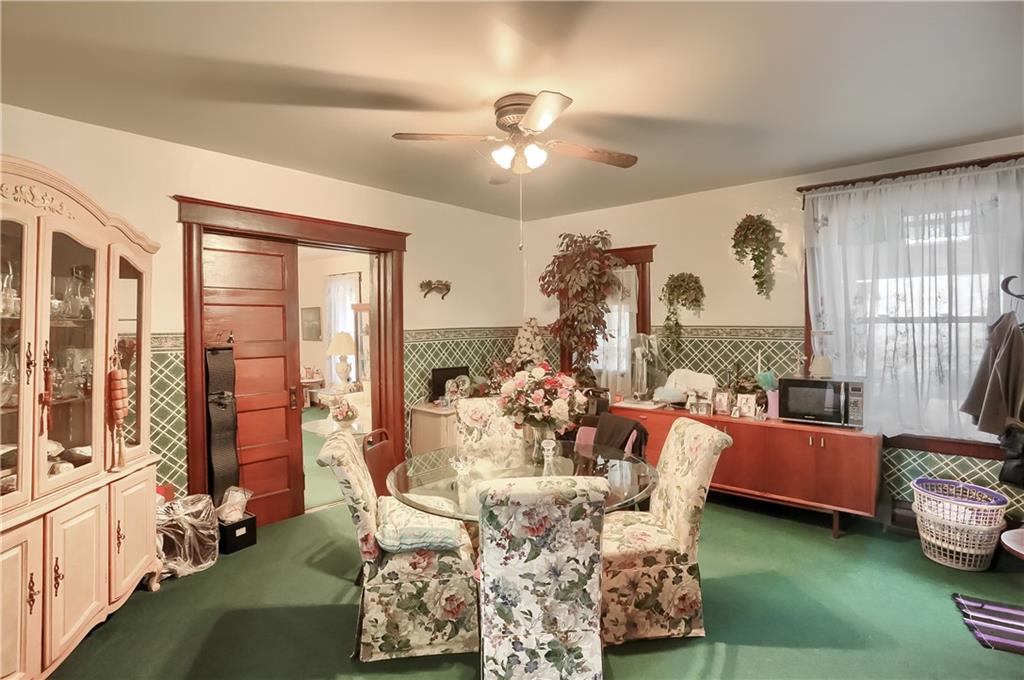 191 Pyle Road Jefferson, PA 15344 - Photo 10 of 24 a living room with furniture and a large window