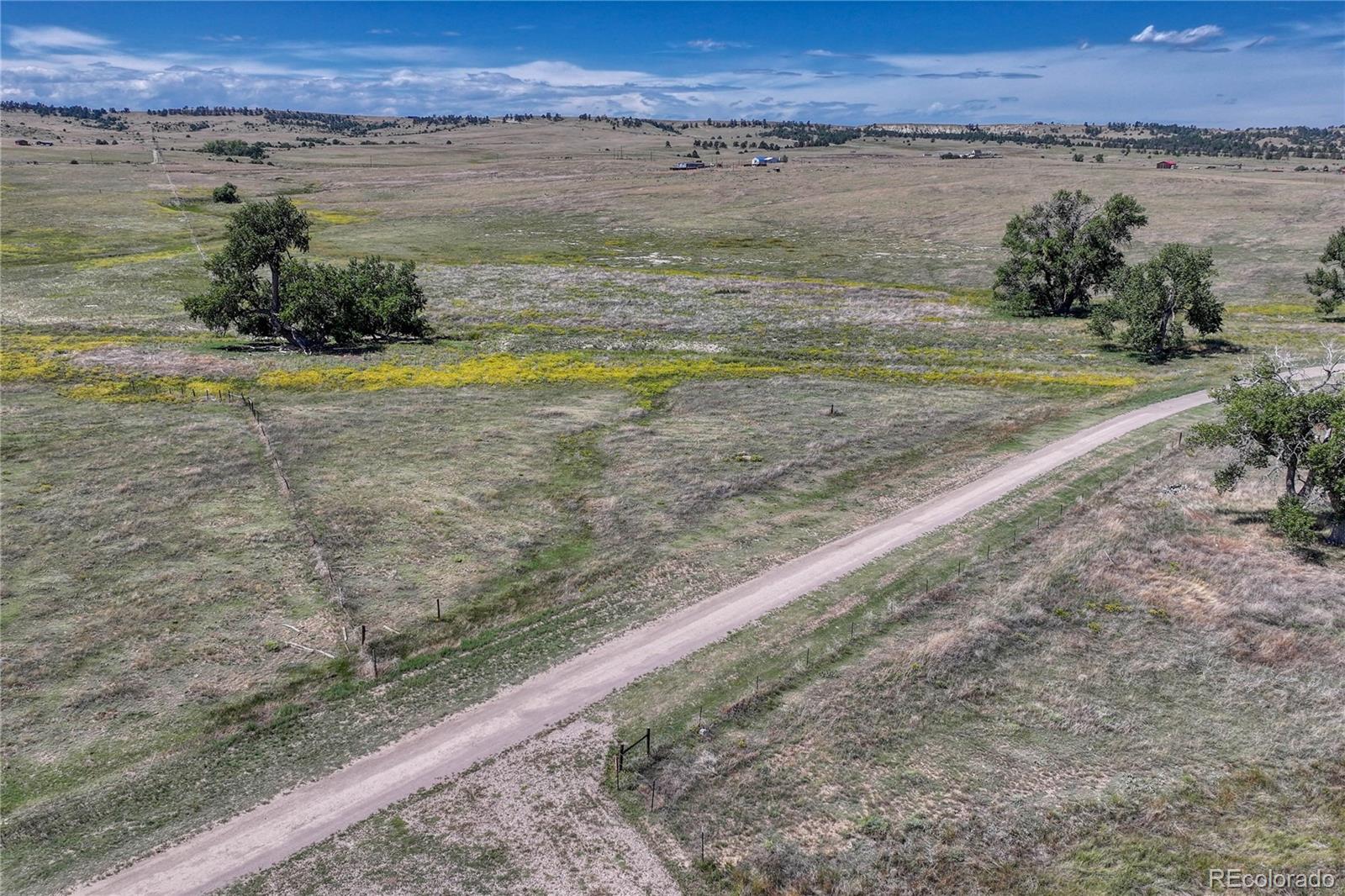 Fiddleback Ranch Road Kiowa, CO 80117 - Photo 6 of 28 a view of a lake with a mountain