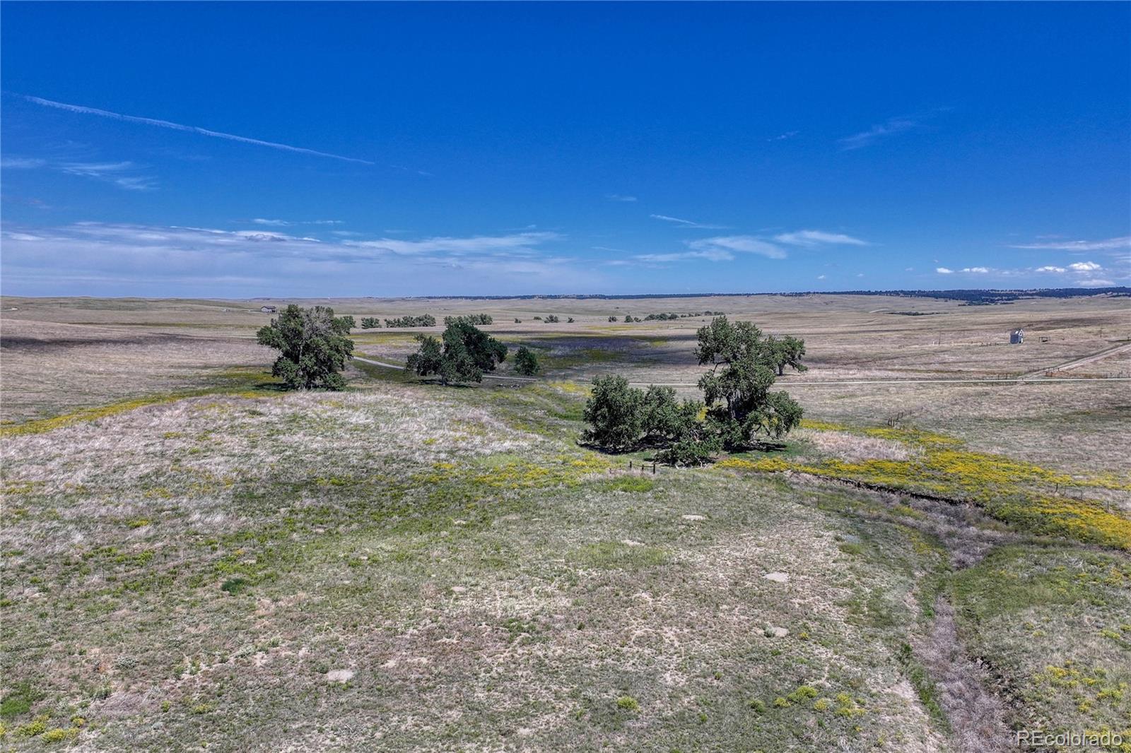 Fiddleback Ranch Road Kiowa, CO 80117 - Photo 7 of 28 a view of an ocean beach