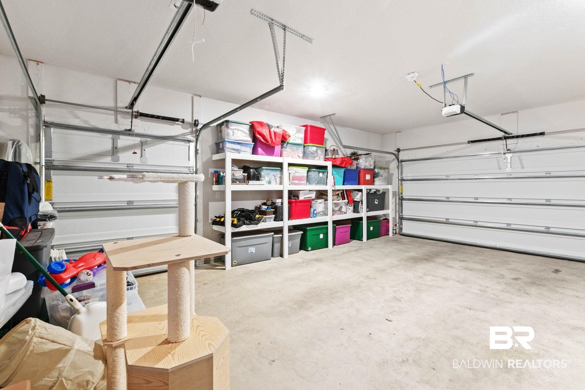 9815 Lakeview Drive Foley, AL 36535 - Photo 56 of 100 Garage featuring a garage door opener