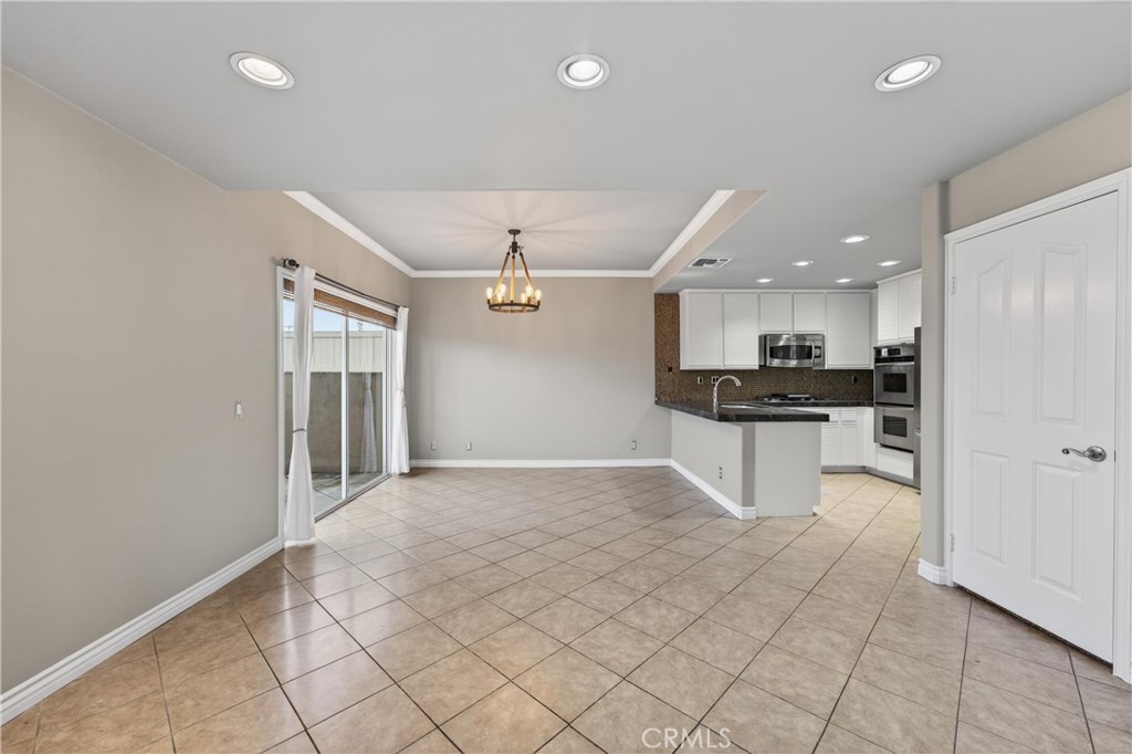 152 Terraza Court Costa Mesa, CA 92627 - Photo 12 of 47 a view of an empty room and kitchen view