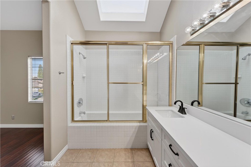 152 Terraza Court Costa Mesa, CA 92627 - Photo 29 of 47 a bathroom with a tub sink and mirror