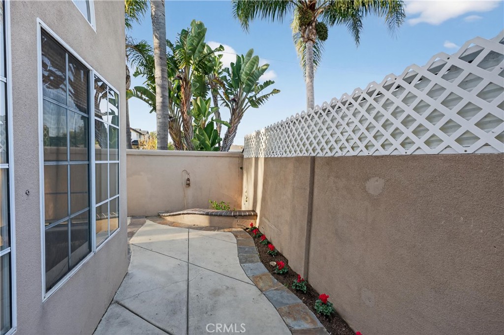 152 Terraza Court Costa Mesa, CA 92627 - Photo 34 of 47 a bathroom with a sink and a mirror