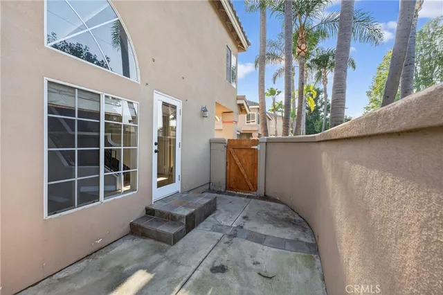 a view of balcony with furniture and wooden floor