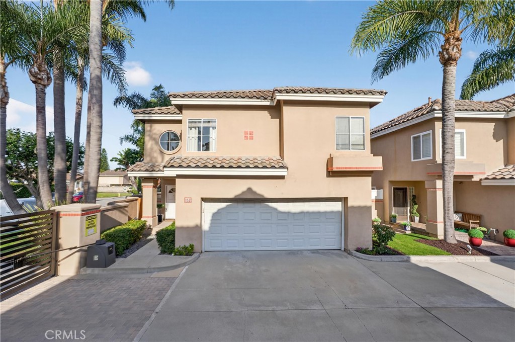152 Terraza Court Costa Mesa, CA 92627 - Photo 47 of 47 front view of a house with a street