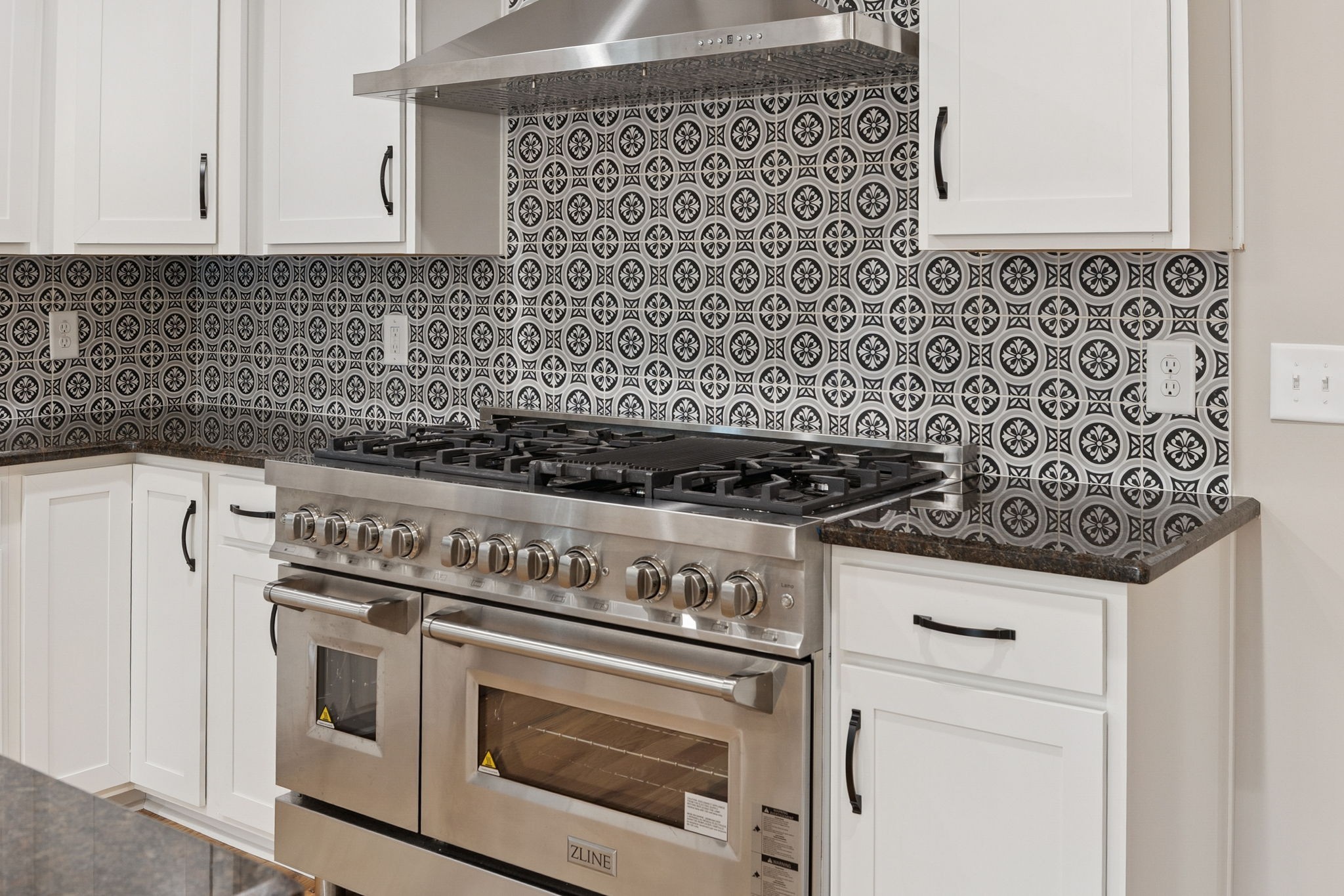 3935 Harmony Grove Road Hopkinsville, KY 42240 - Photo 13 of 64 a stove top oven sitting inside of a kitchen