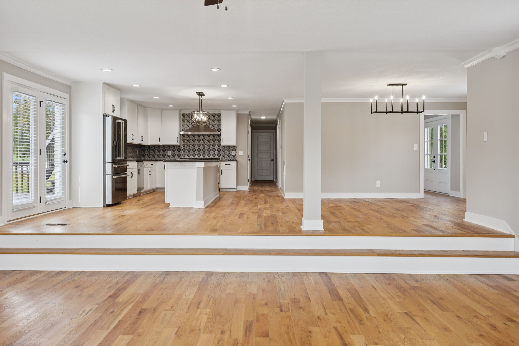 3935 Harmony Grove Road Hopkinsville, KY 42240 - Photo 14 of 64 a view of a kitchen with kitchen island a sink stainless steel appliances and cabinets