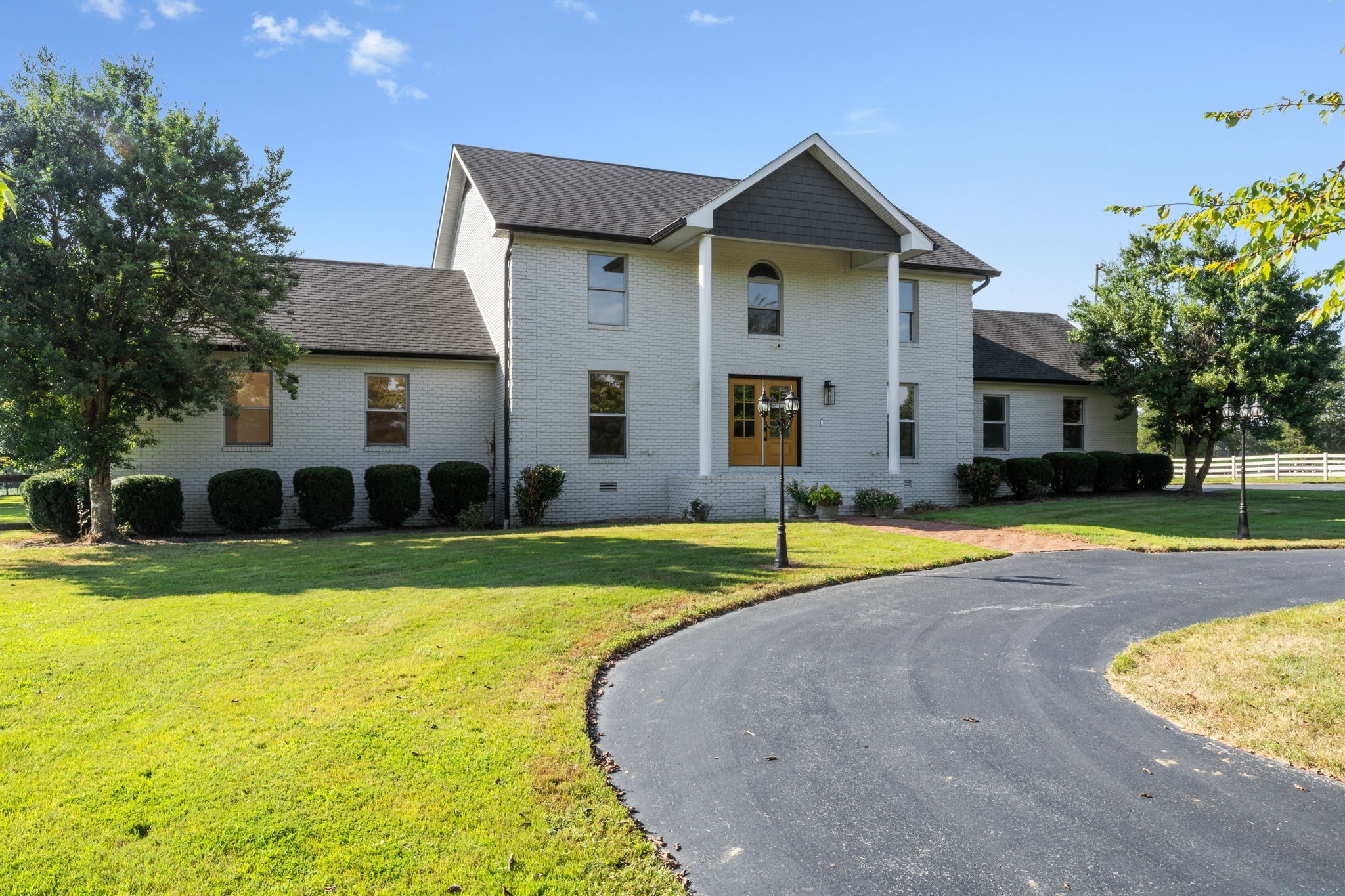 3935 Harmony Grove Road Hopkinsville, KY 42240 - Photo 2 of 64 a view of a house with swimming pool and yard