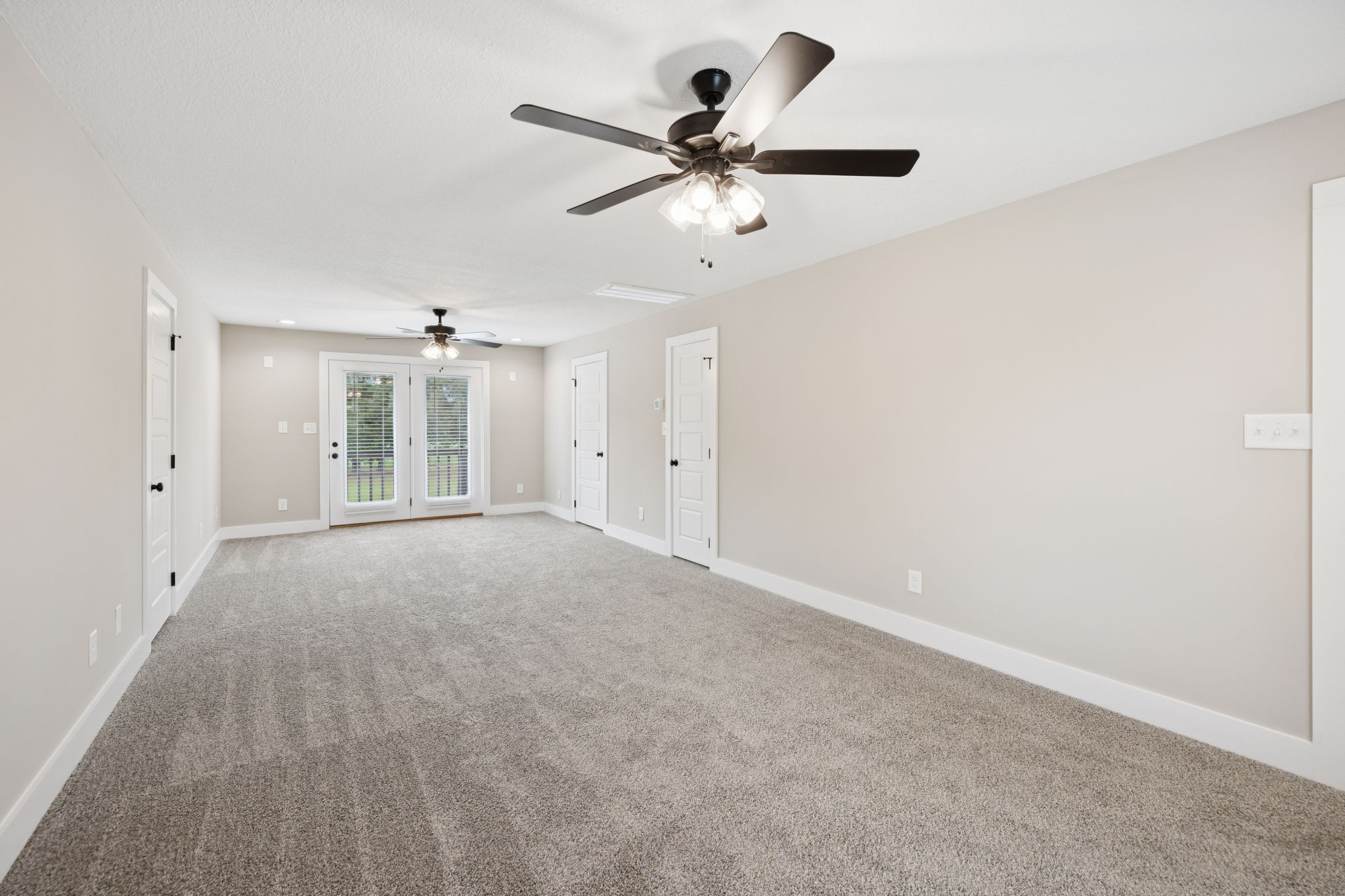 3935 Harmony Grove Road Hopkinsville, KY 42240 - Photo 24 of 64 a view of an empty room with a ceiling fan