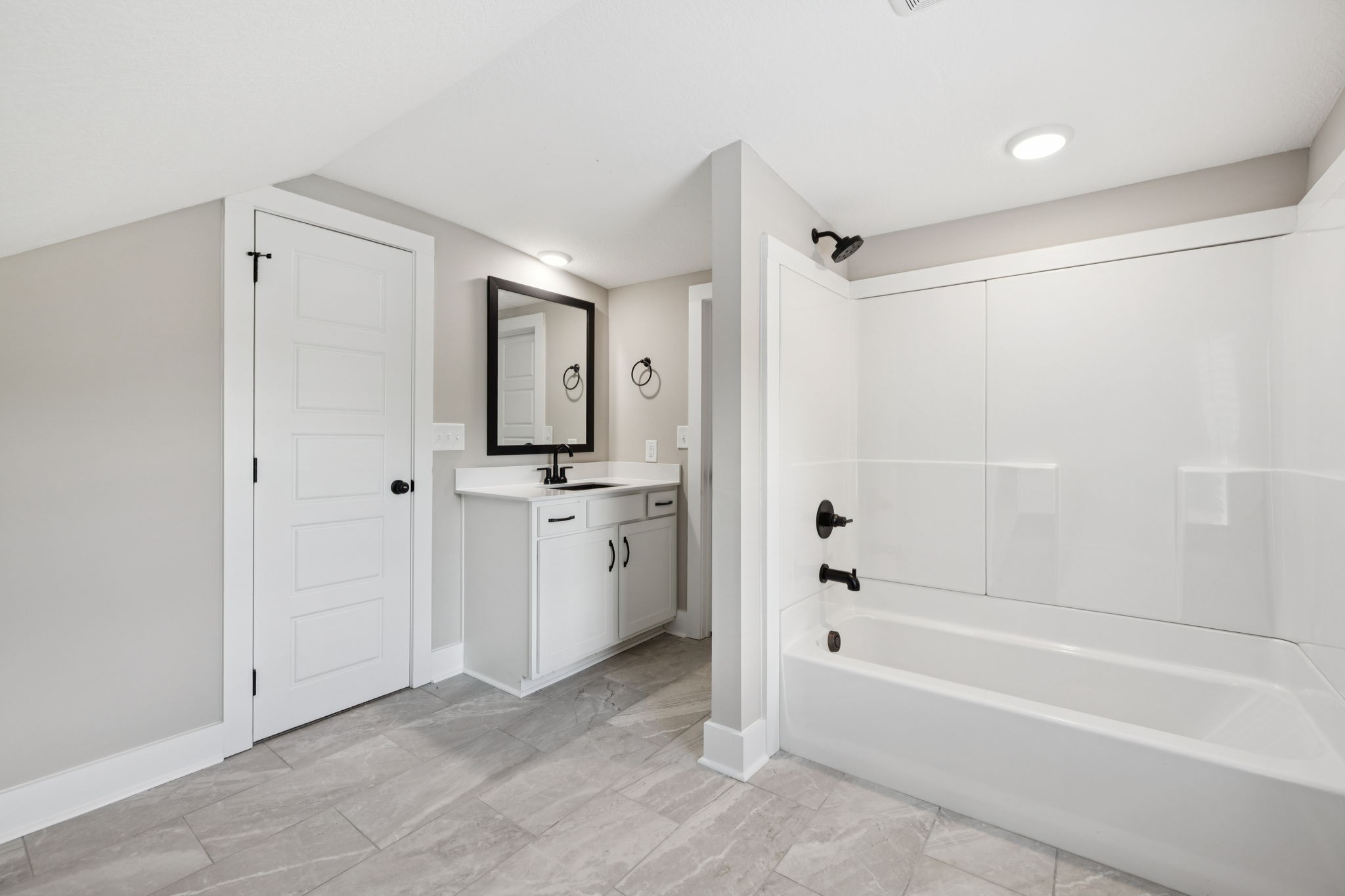 3935 Harmony Grove Road Hopkinsville, KY 42240 - Photo 34 of 64 a bathroom with a tub sink shower and mirror