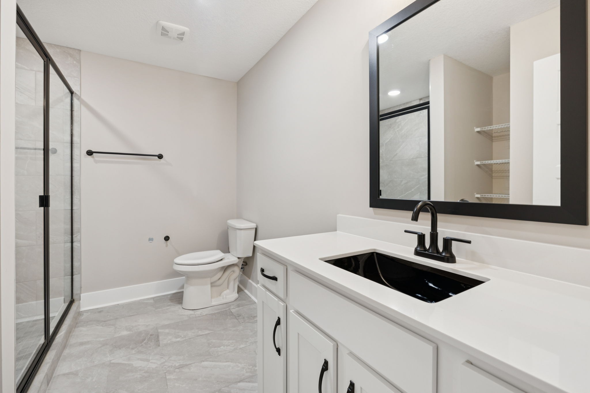 3935 Harmony Grove Road Hopkinsville, KY 42240 - Photo 43 of 64 a bathroom with a sink toilet and mirror