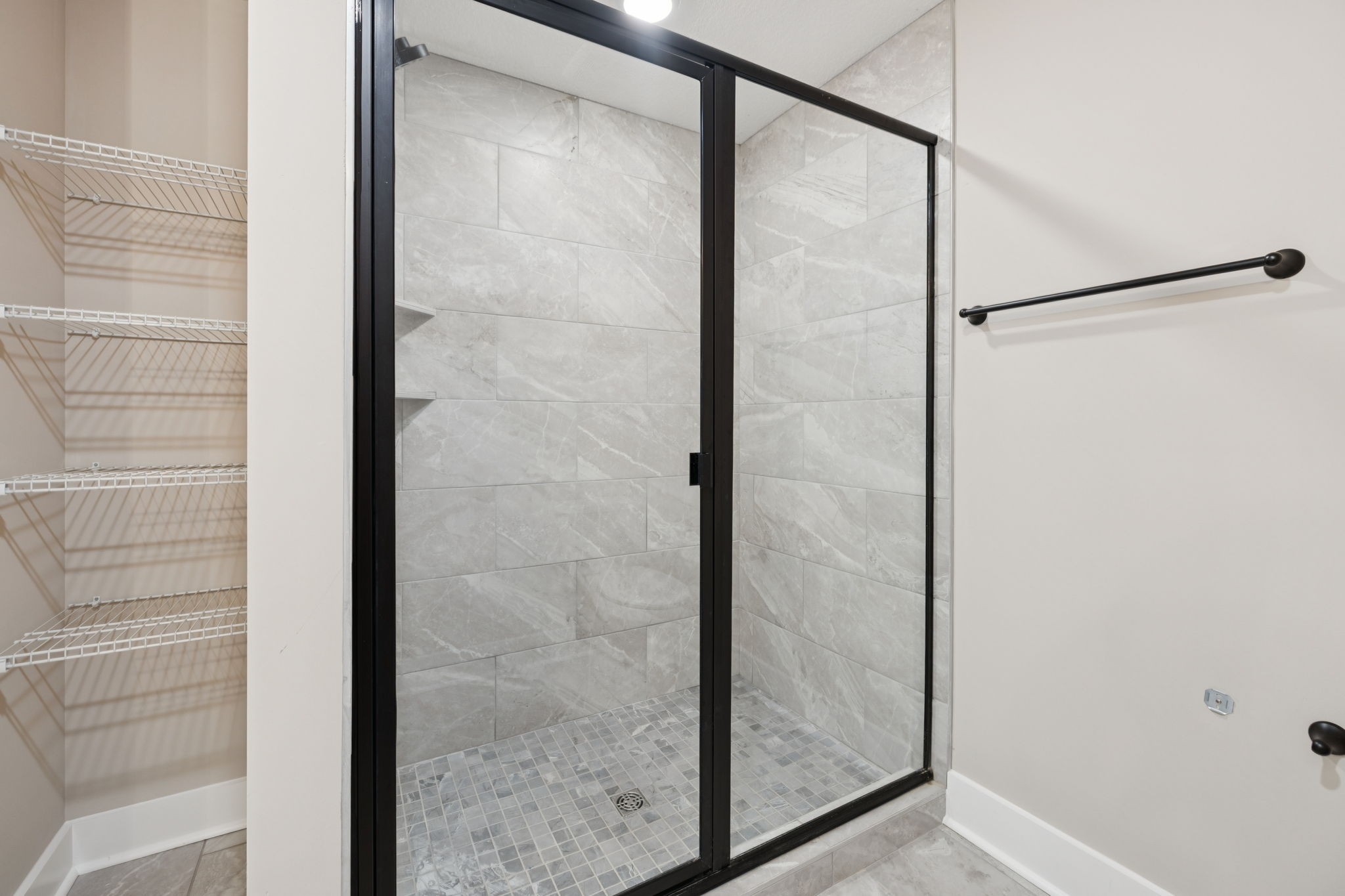 3935 Harmony Grove Road Hopkinsville, KY 42240 - Photo 44 of 64 a bathroom with a glass shower door