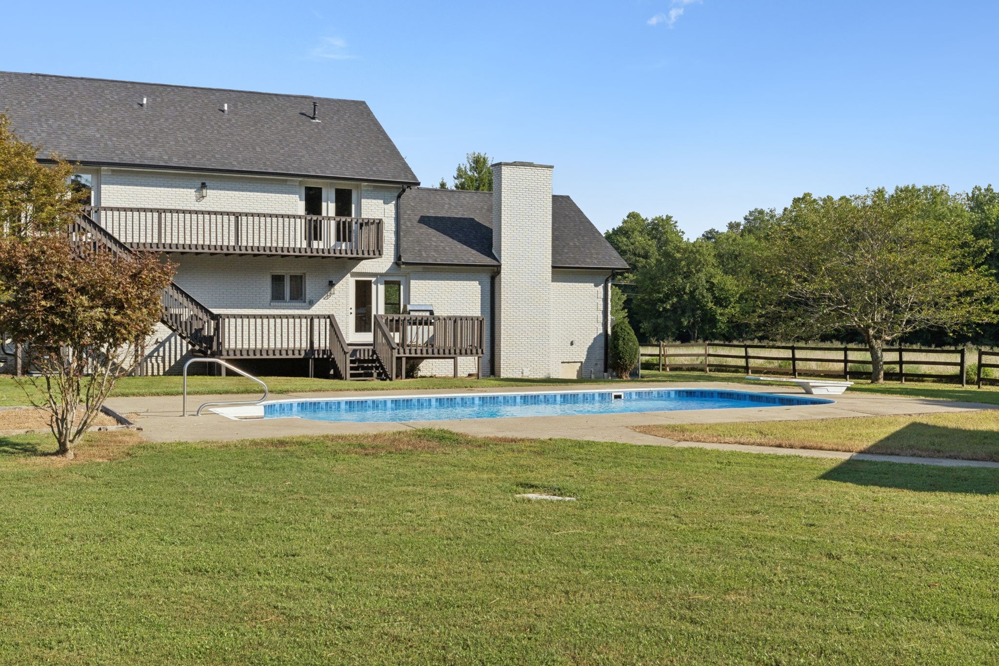 3935 Harmony Grove Road Hopkinsville, KY 42240 - Photo 46 of 64 a view of a house with a swimming pool