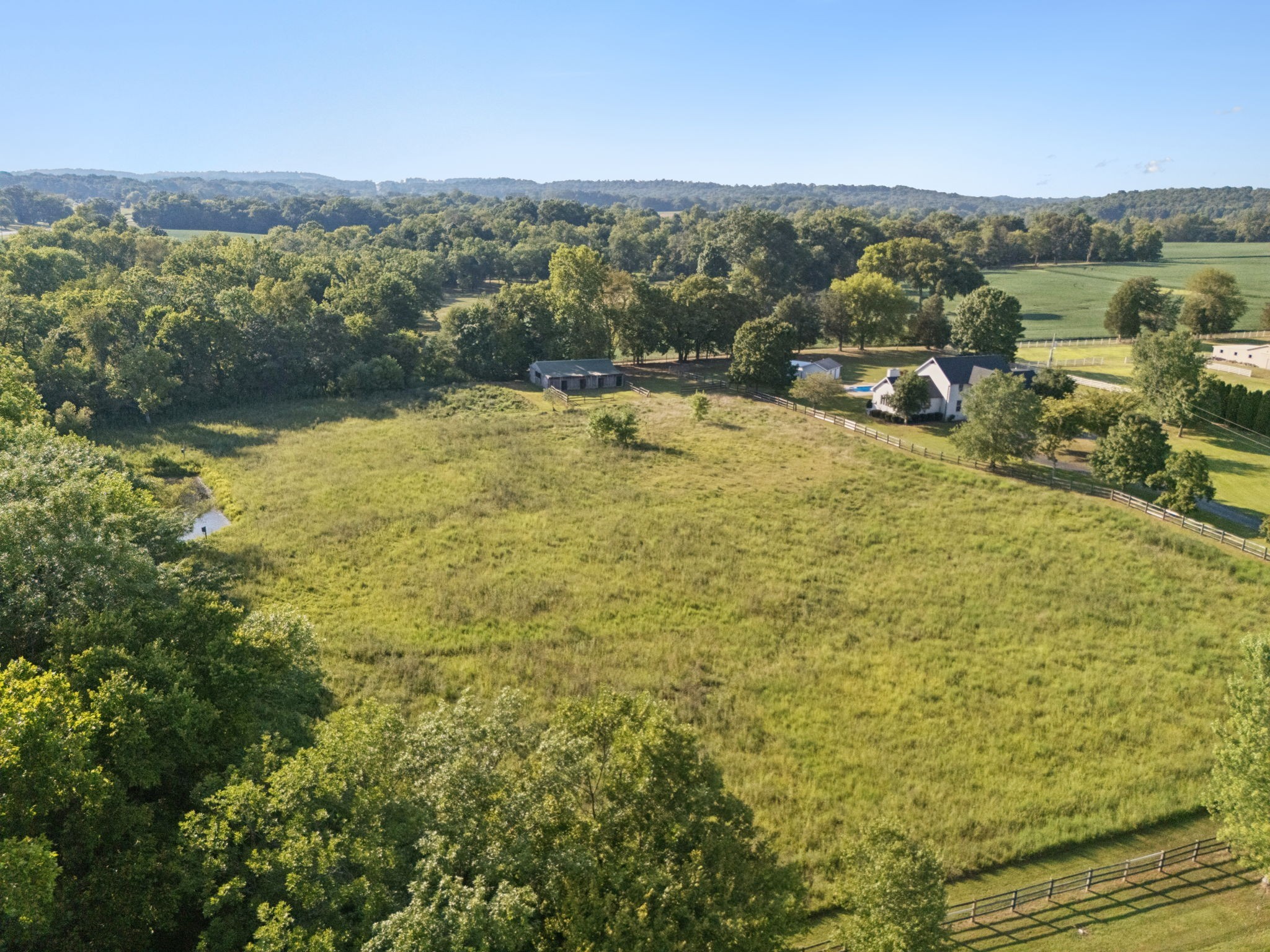 3935 Harmony Grove Road Hopkinsville, KY 42240 - Photo 51 of 64 a view of a lake with houses