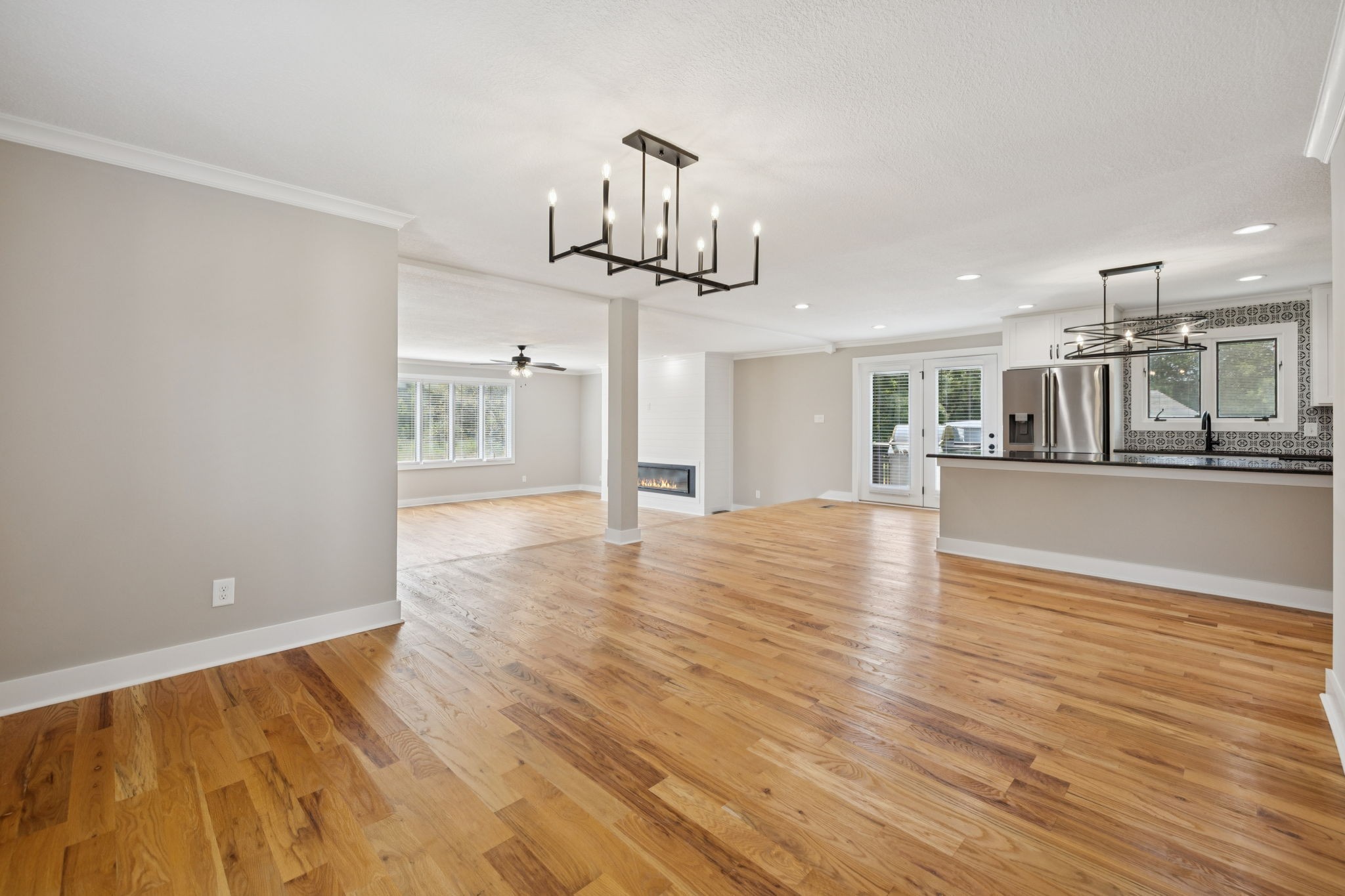 3935 Harmony Grove Road Hopkinsville, KY 42240 - Photo 7 of 64 a view of a kitchen with wooden floor and a sink
