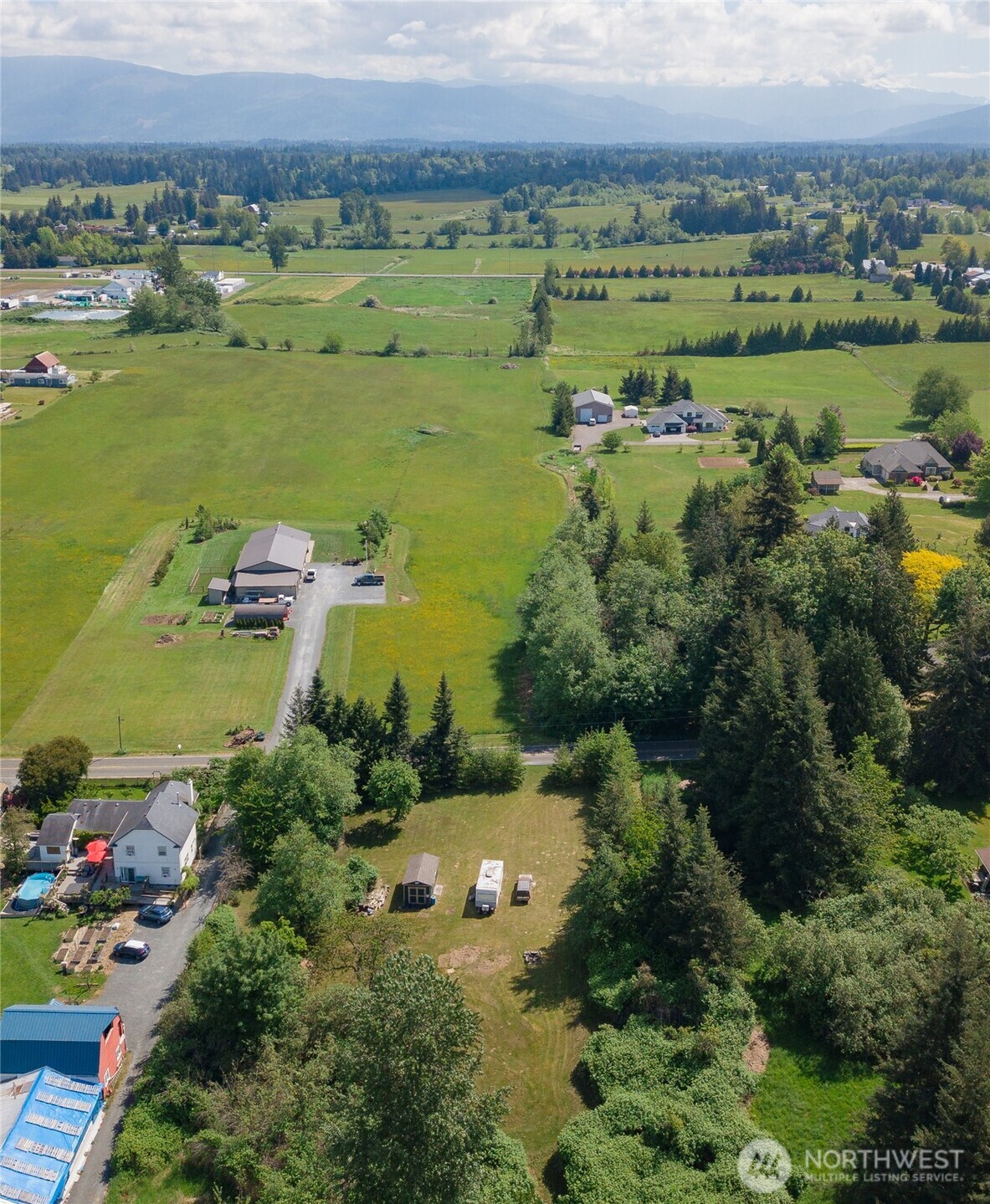 6011 Medcalf Road Bellingham, WA 98226 - Photo 5 of 22 an aerial view of a houses with a lake view