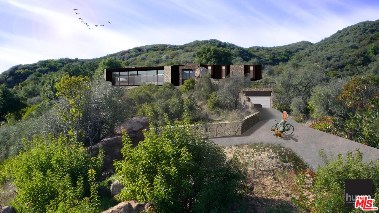 1575 Tuna Canyon Road Topanga, CA 90290 - Photo 1 of 9 a view of a house with a mountain yard