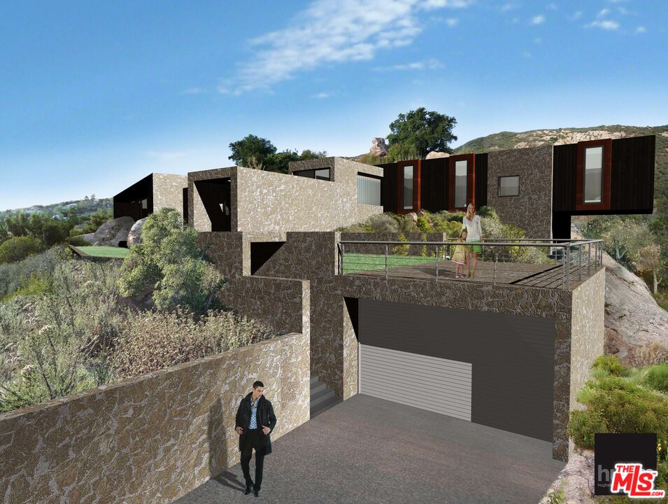 1575 Tuna Canyon Road Topanga, CA 90290 - Photo 2 of 9 a terrace of a house with outdoor seating