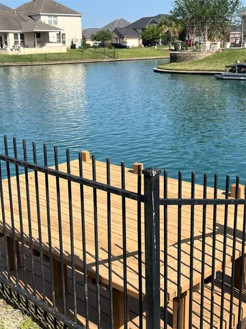 a view of swimming pool with outdoor space and seating
