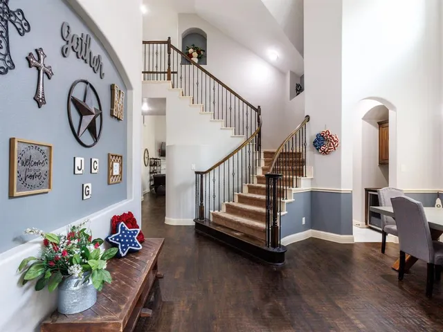 a view of entryway with wooden floor
